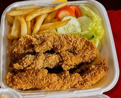 Chicken tenders plate with fries and salad